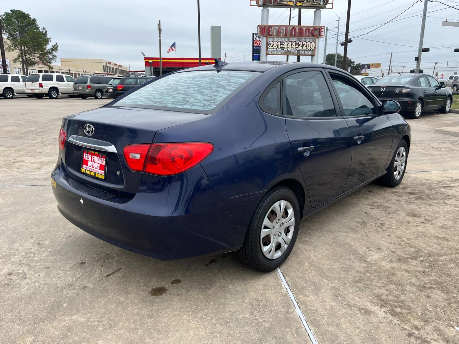 2010 blue Hyundai Elantra GLS (KMHDU4ADXAU) with an 2.0L L4 DOHC 16V engine, Automatic transmission, located at 14700 Tomball Parkway 249, Houston, TX, 77086, (281) 444-2200, 29.928619, -95.504074 - Photo #6